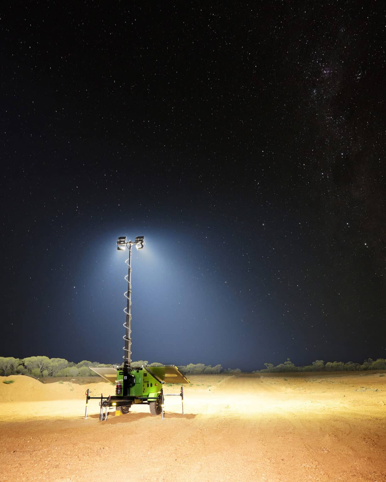 An EcoQuip Mobile Solar Light Tower illuminating a site in the desert.