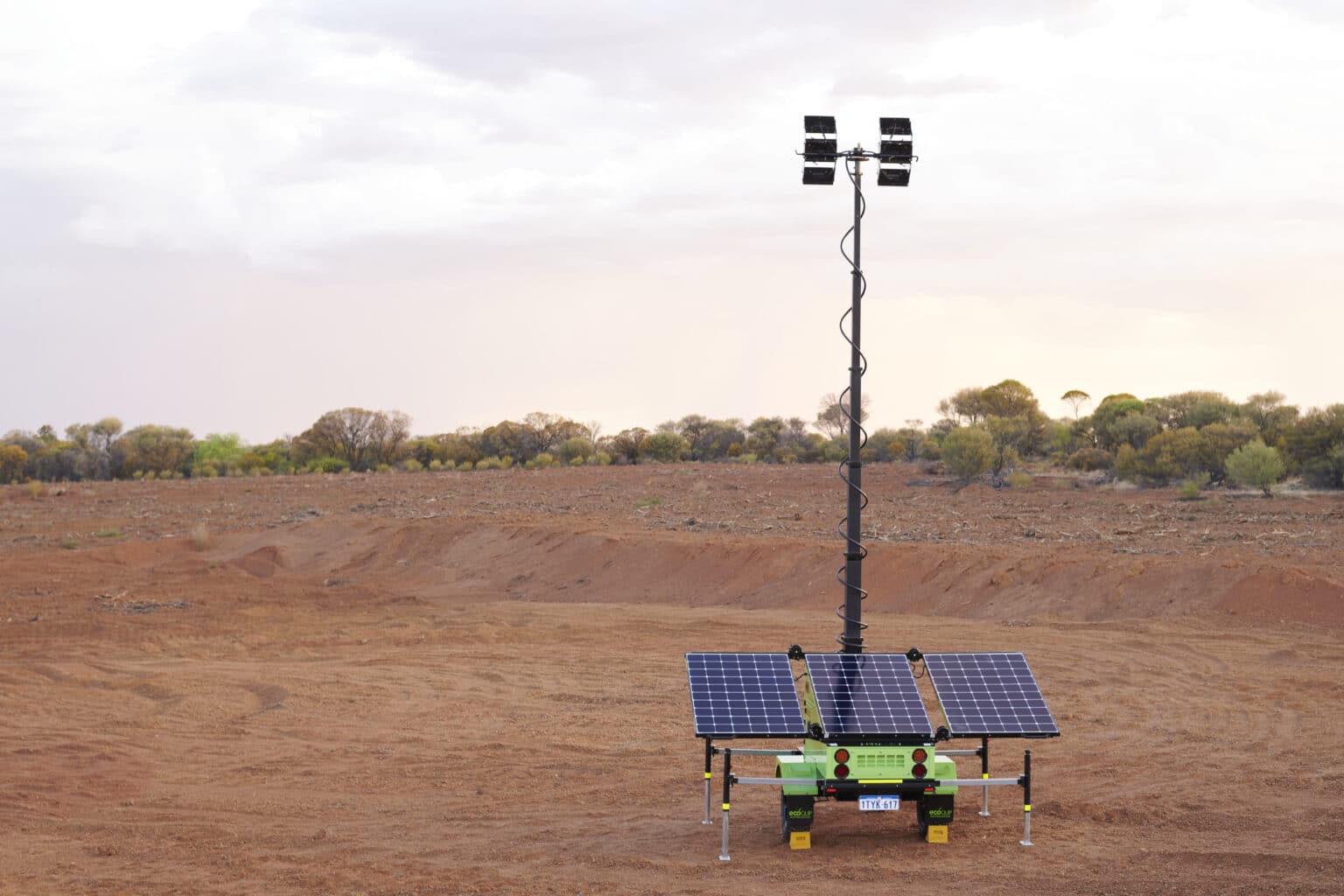 A field illuminated by an EcoQuip solar powered light tower.